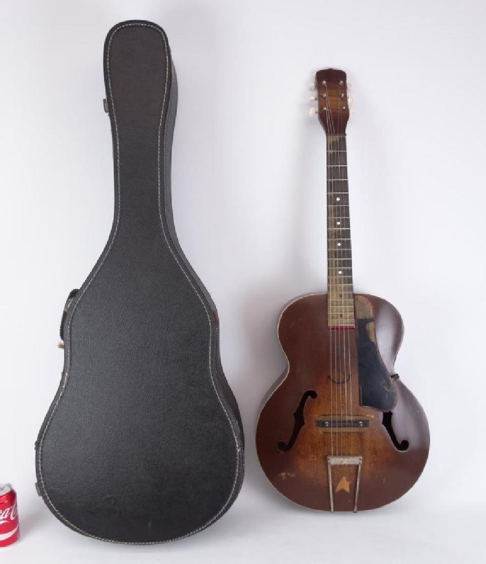 C. 1940's Harmony Guitar: C. 1940's Harmony guitar. Has Nautical motif painted on it. Tuners and bridge old replacements. Pick guard painted as a whale. Comes with case.