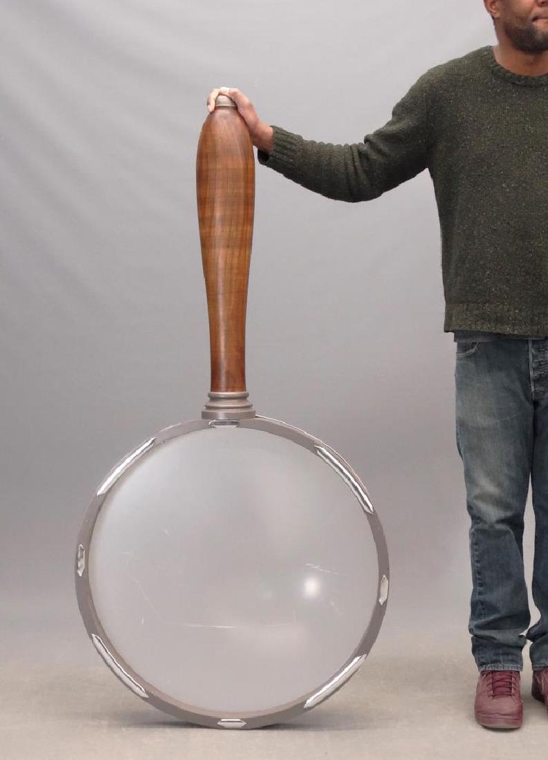 Oversized Magnifying Glass sign (1 of 5)