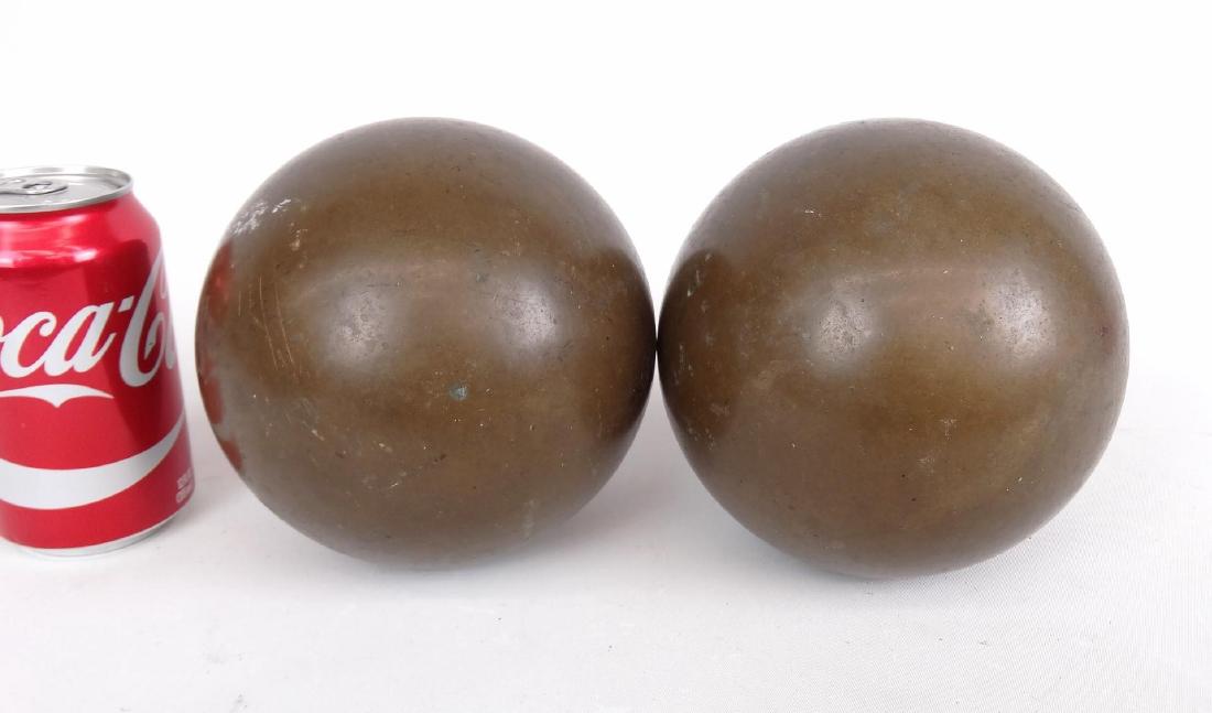 Pair Brass Balls: Pair of brass balls. Approx. 18LBS each and 6" D..