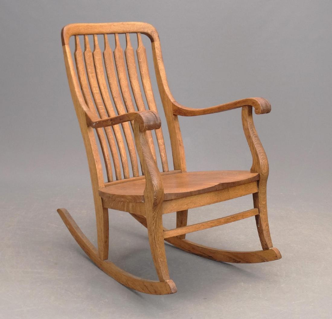 C. 1900 Oak Rocking Chair: C. 1900 oak rocking chair. 17" seat Ht., 37" overall Ht..