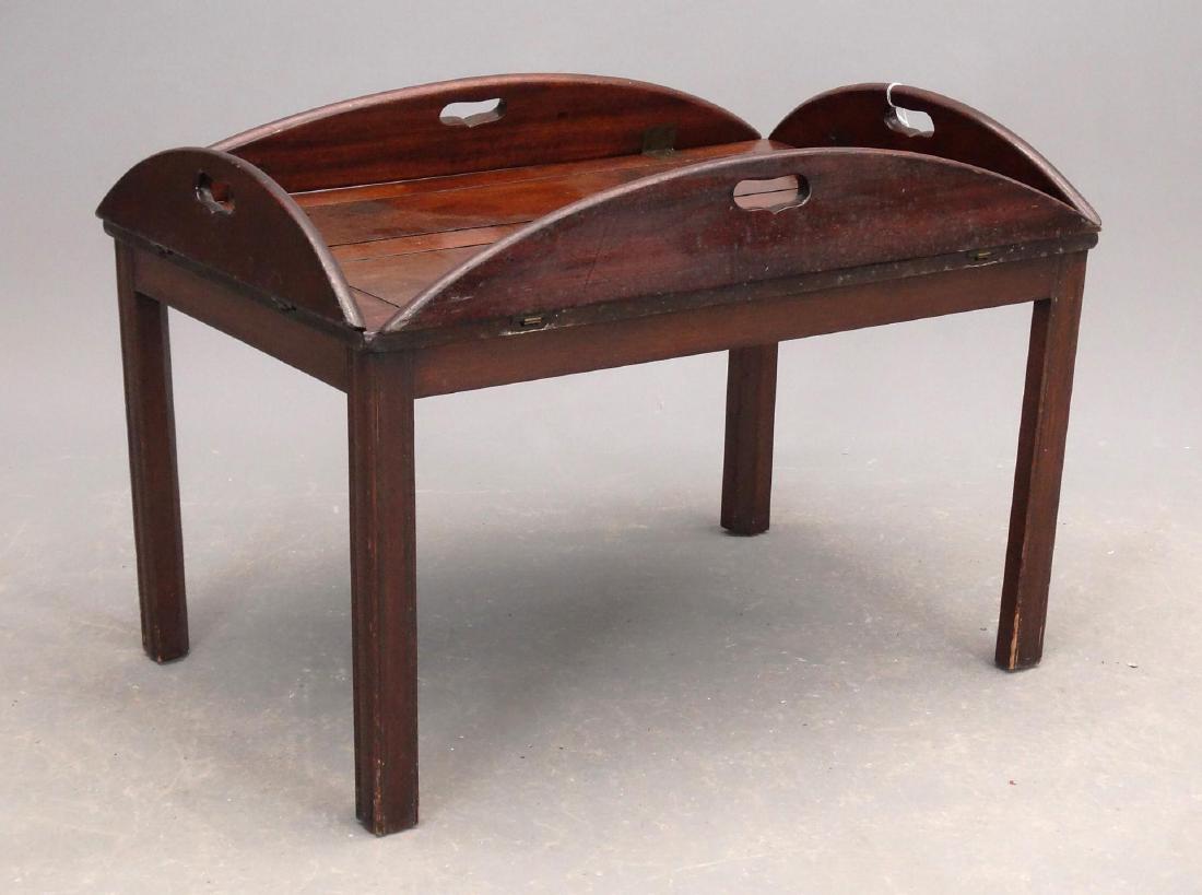 Butlers Tray Table: C. 1900's mahogany butlers tray table. 29" x 37" x 17" Ht..