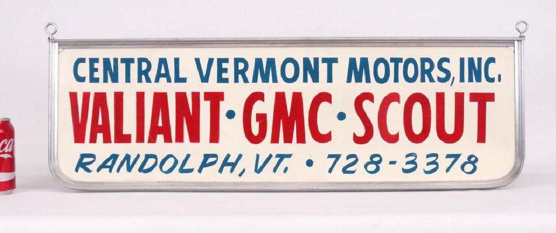 Trade Sign: Metal trade sign, “Central Vermont Motors Inc Randolph, Vermont, Chrysler, Plymouth, Valiant, GMC, Scout". Double sided. 9 ¾" x 30 ½".