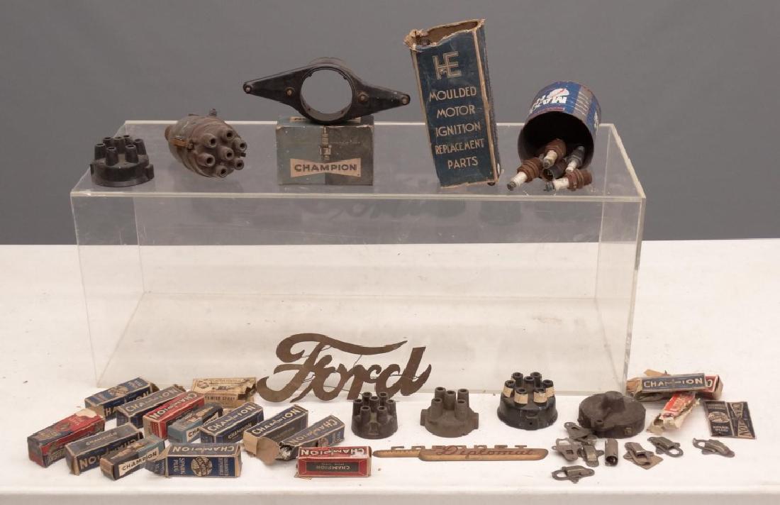 Distributor Caps & Spark Plugs: Lot misc. distributor caps and spark plugs.