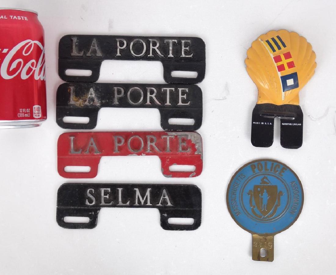 License Plate Toppers: Lot of vintage license plate toppers.