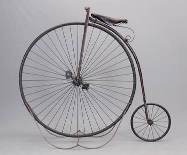 C. 1879 Columbia High Wheel Bicycle: C. 1879 Columbia open head high wheel bicycle. 52". Old "Wheelmen" restoration. Good condition. Sold at Copake Auction April 21, 2001 (lot 185).