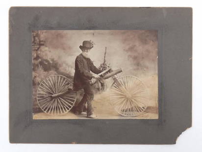 Early Photograph With Boneshaker: Early humorous photograph, bearded gentleman with boneshaker. Right corner chipped. 8" x 6".