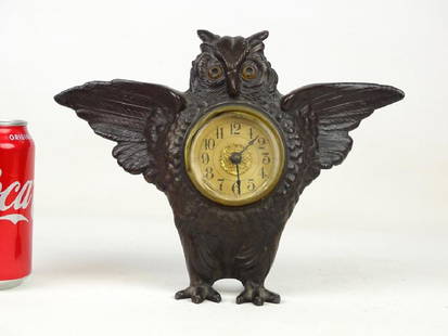 Cast Iron Figural Owl Clock: Early cast iron figural owl clock. 8 1/2" Ht., 10 1/2" W..