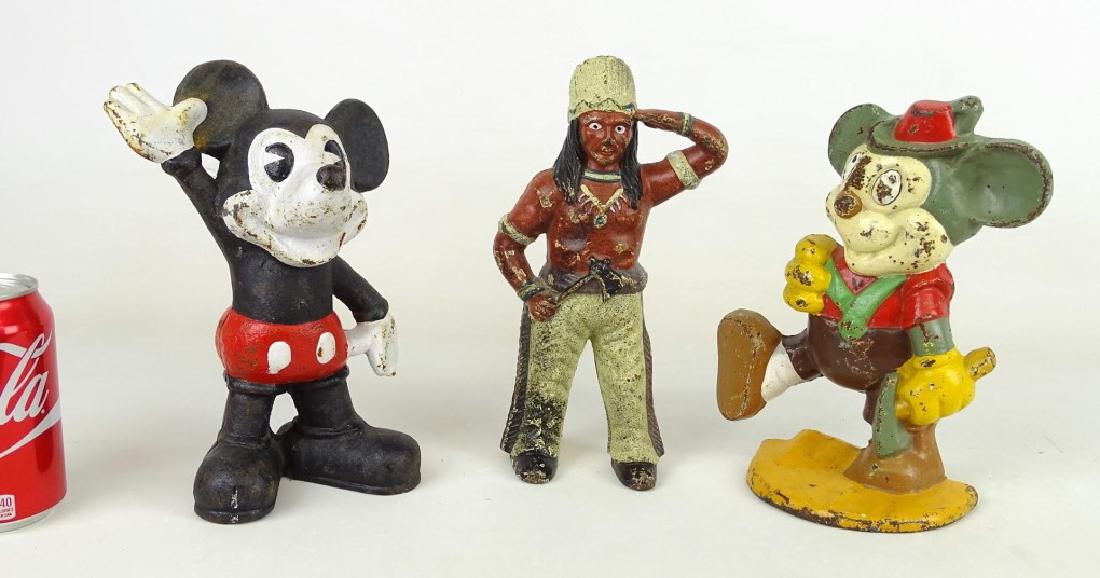 Doorstop Lot: Lot (3) cast iron decorative doorstops. 9" to 10" Ht..