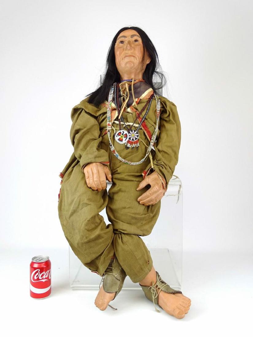 Native American Figure: Plaster or composition Native American figure. Approx. 40" L..