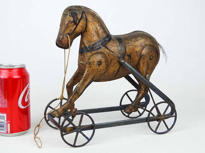 C. 1890's Horse Pull Toy: C. 1890's metal horse pull toy (cast iron legs), mechanical action. 9" x 4 1/2" x 9" Ht..