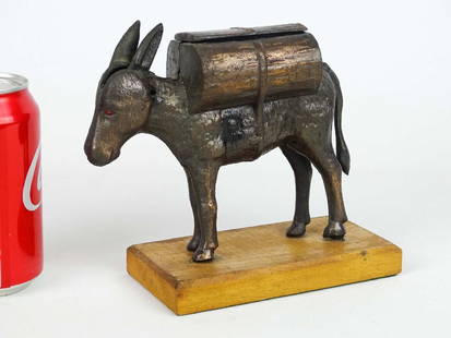 C. 1930's Mechanical Donkey Cigarette Dispenser: C. 1930's cast metal mechanical donkey cigarette dispenser. 7" L., 5 1/2" Ht.. Marked MCCERN MFG. CO..