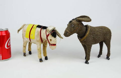 Toy Lot: Lot including early nodding donkey on wheels toy (8" L., 7" Ht.), and felt covered donkey (8" x 5 1/2").