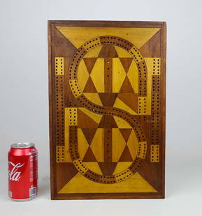 Cribbage Game Board: Early 20th c. cribbage game board. Mixed woods. (6) peg playing pieces. 15 3/4" x 10 1/2".
