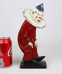 Doorstop: C. 1920 cast iron doorstop, Clown. Hubley Foundry, Lancaster Penna.. Reference: The Doorstop Book, Smith. p. 227 and cover illustration: Doorstops, Identification & Values, Jeanne Bertoia, 1985. 10