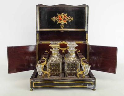 19th c. French Liquor Cabinet: 19th c. French Boulle style liquor cabinet with (4) decanters and (7) shots. Signed "TAHAN / PARIS". 13 1/2" x 9 3/4" x 10 1/2" Ht.. Imperfections.