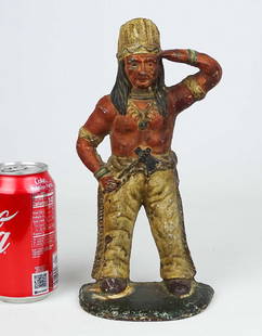 Doorstop: Native American with tomahawk cast iron doorstop. Scarce form. 10 1/4" Ht..