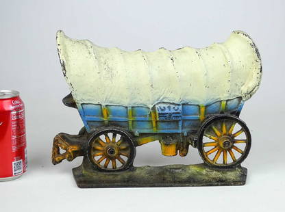 Doorstop: Conestoga Wagon with tongue cast iron doorstop. C. 1930's. Reference: The Doorstop Book, Smith. p. 178. 12" x 9" Ht..