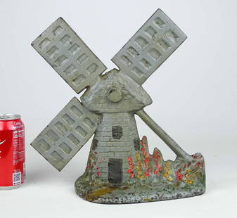 Doorstop: Windmill cast iron doorstop. Signed "Pat. Pend.". 11 1/2" x 12 1/4".