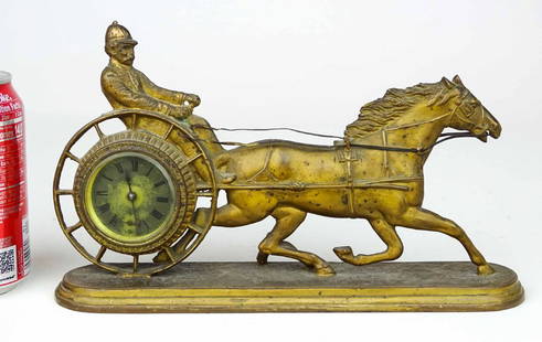 Spelter Metal Figural Clock: C. 1880's-90's spelter metal figural clock, sulky and rider. Signed "WELCH". 10" x 6 1/2".
