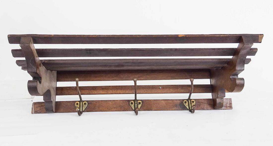 Wall Rack: C. 1900's wall rack with hooks. 26" W..