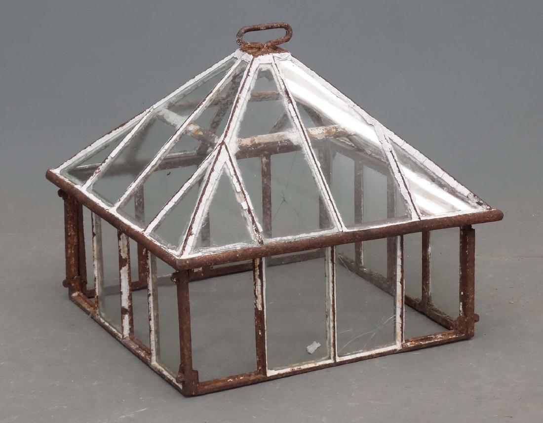 Terrarium: Iron and glass terrarium. 20" x 20" x 17". Some glass needs replacing.