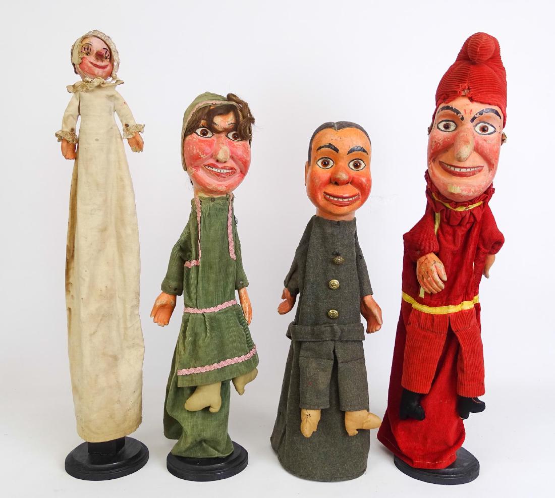Early Folk Art Puppets: Lot (4) early wood and cloth painted puppets. Tallest 25" Ht..