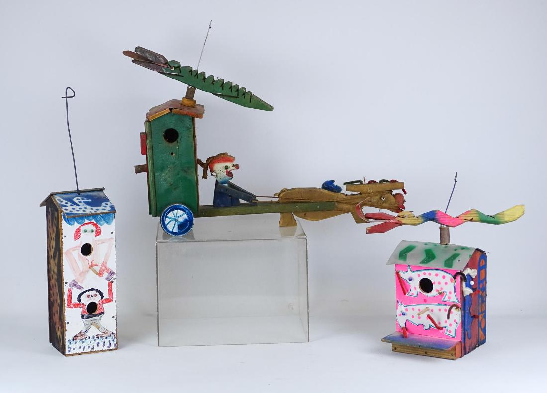 Ivan Laycock (20th Century): Lot (3) pieces by Ivan Laycock (20th Century), including whirligig with alligator. 23" L.. (2) birdhouses. Marker and spray paint on wood (13" x 5" x 4"), marker and spray painted stencils on wood wit
