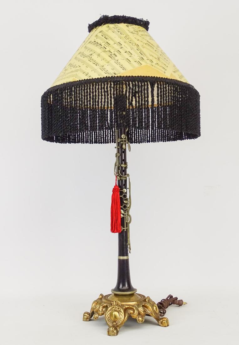 Clarinet Lamp: Clarinet lamp with sheet music shade. 37" Ht..