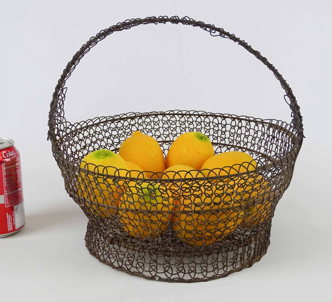 Fancy Wire Basket: Fancy wire basket. 12" D., 13" Ht..