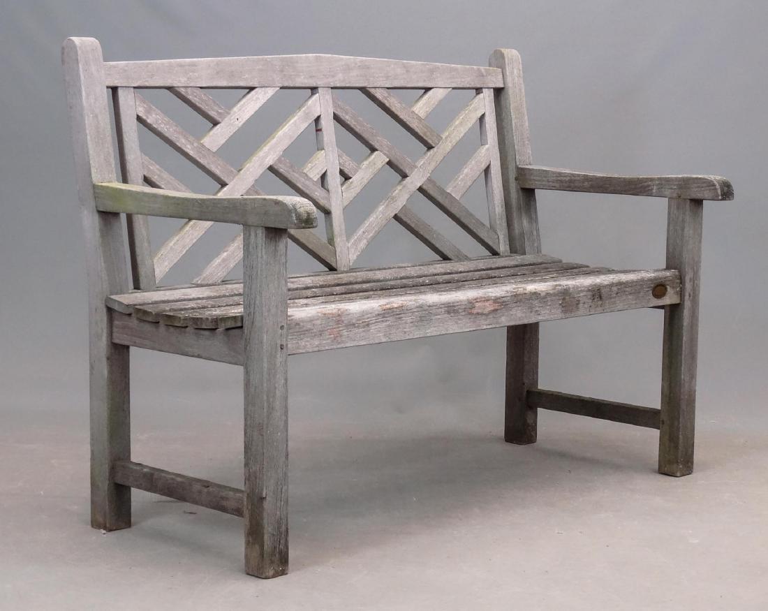 Teak Settee: Teak settee. Labeled "Outdoor Designs LTD. / Danbury CT.". 48" W..