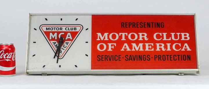 Motor Club Of America Clock: Vintage Motor Club Of American clock. 25 1/2" x 10 1/2". Cracked near hands.