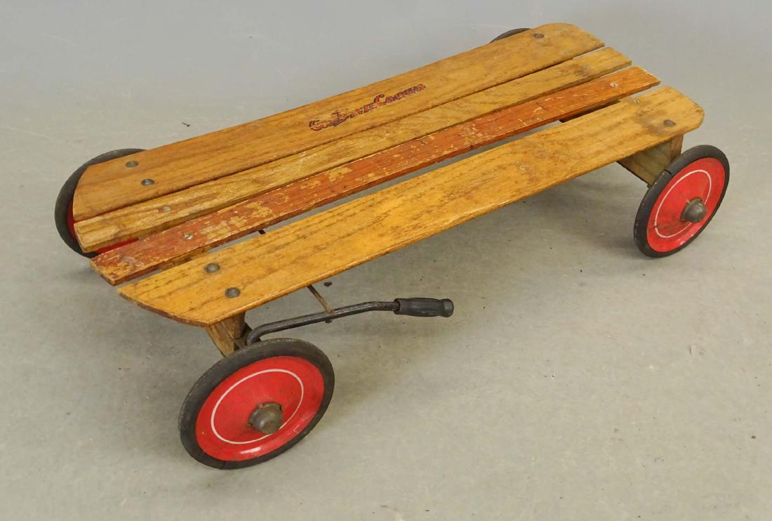 C. 1940's Go Devil Child's Coaster: 1940's Go Devil child's coaster sled with wheels and steering handle. 30" L..