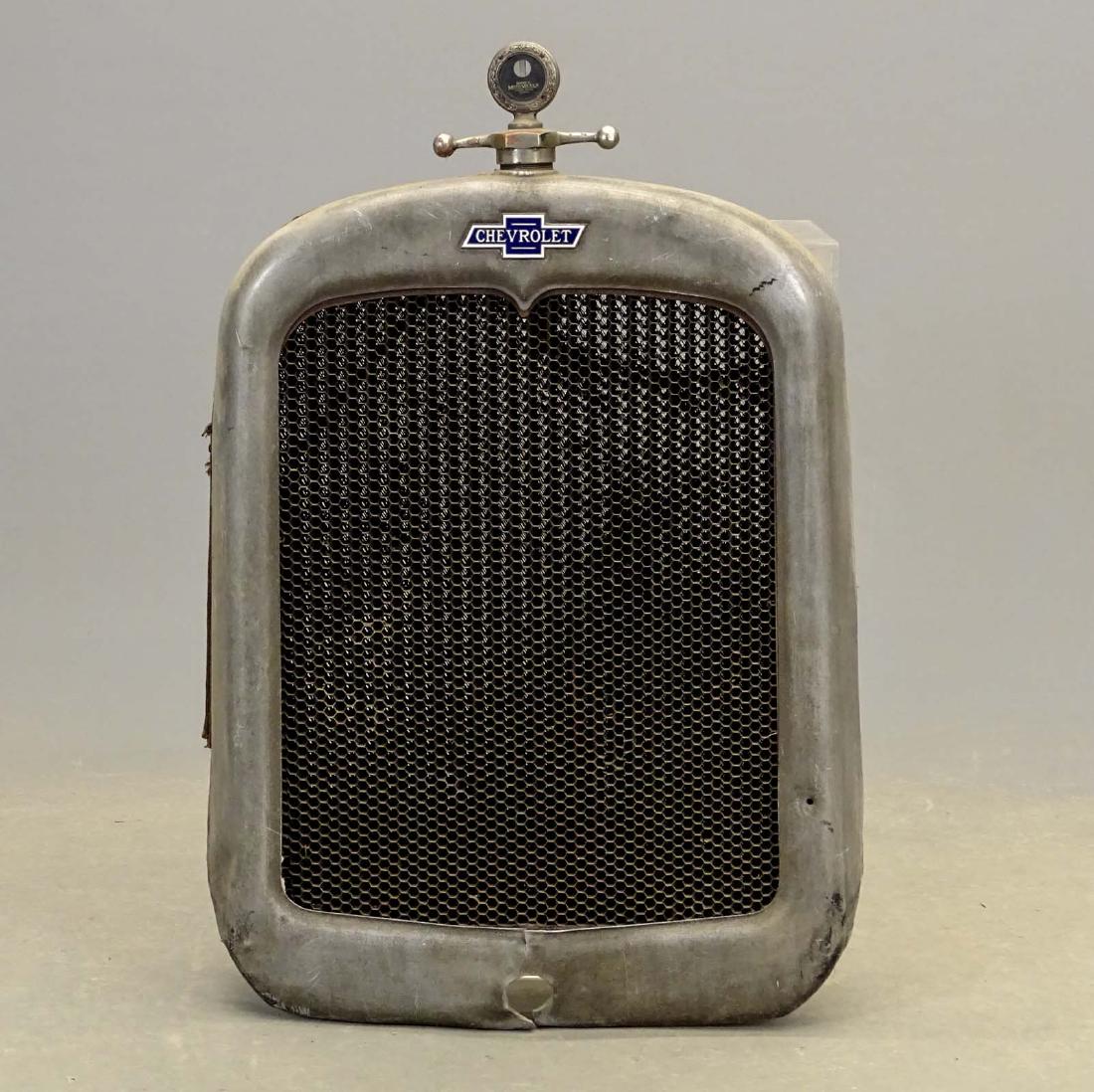Early Chevrolet Automobile Grill: Early Chevrolet automobile grill with Boyce Moto Meter. Fair condition.