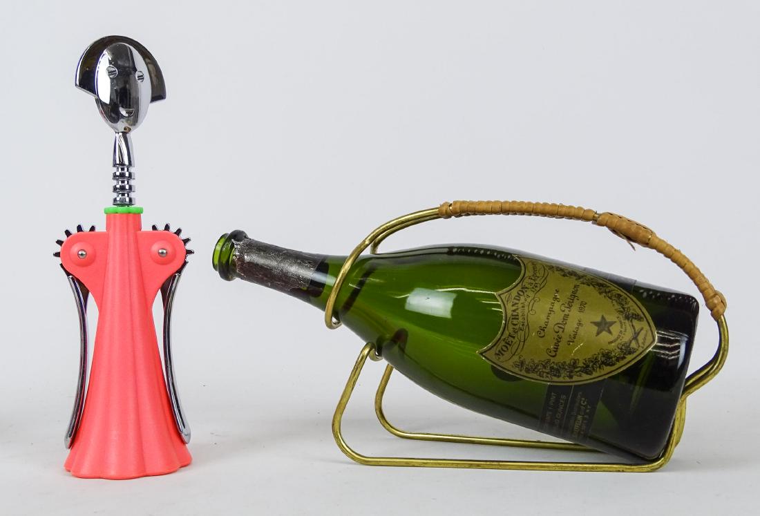 Mid Century Wine Bottle Holder Lot: Mid Century wine bottle holder, along with signed Alessi Italy cork screw.