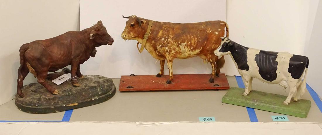 Cow Collection: Misc. cow collection including chalkware (imperfections) cast aluminum "Holstein-Friesian True Type", pull toy (imperfections).