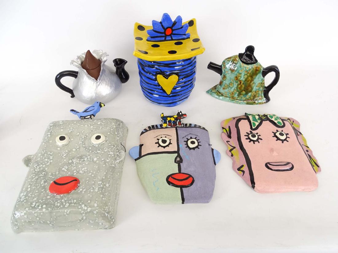 Babroff Art Pottery: Collection of "Babroff" art pottery including (3) face wall plaques, teapot and cookie jar, Kolin teapot.
