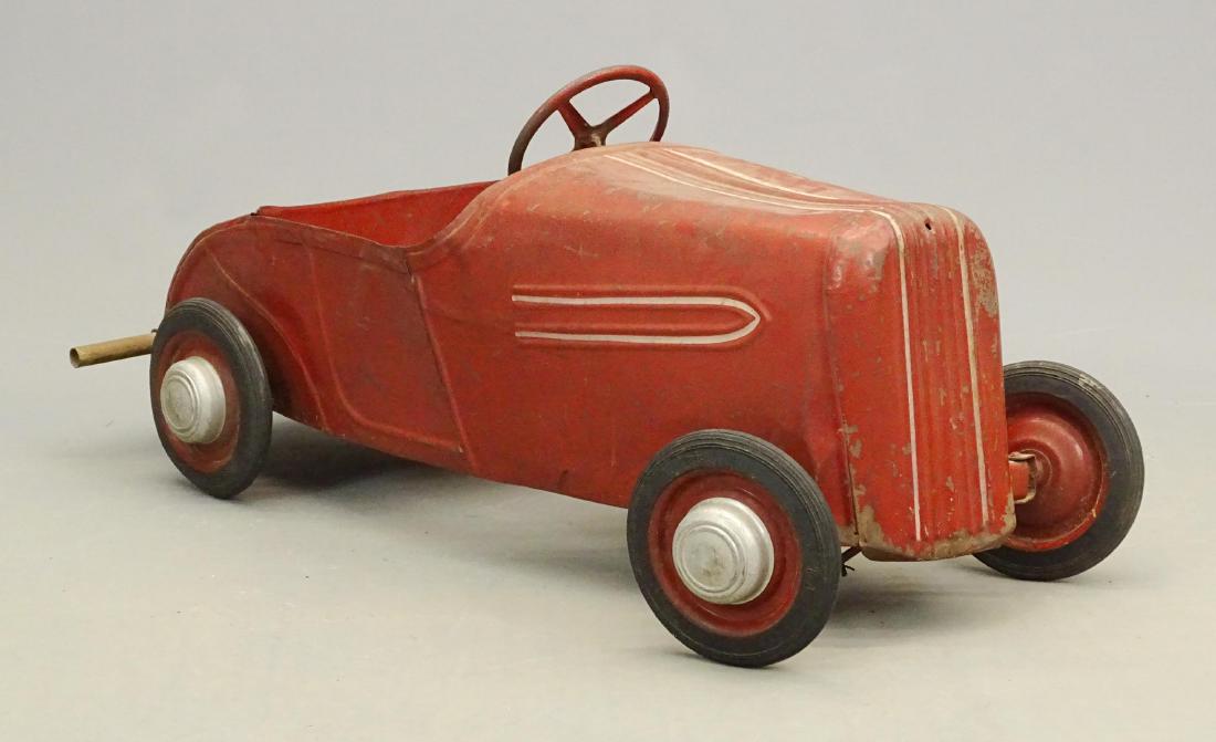 Pedal Car: C. 1930's pedal car. 43" L..