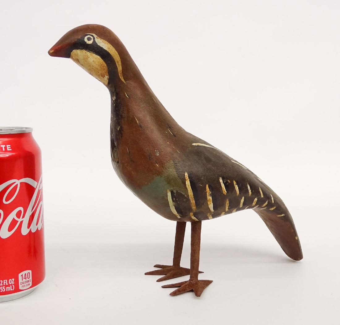 Folk Art Wooden Bird: Folk art wooden bird with metal legs. 10" L., 8" Ht..