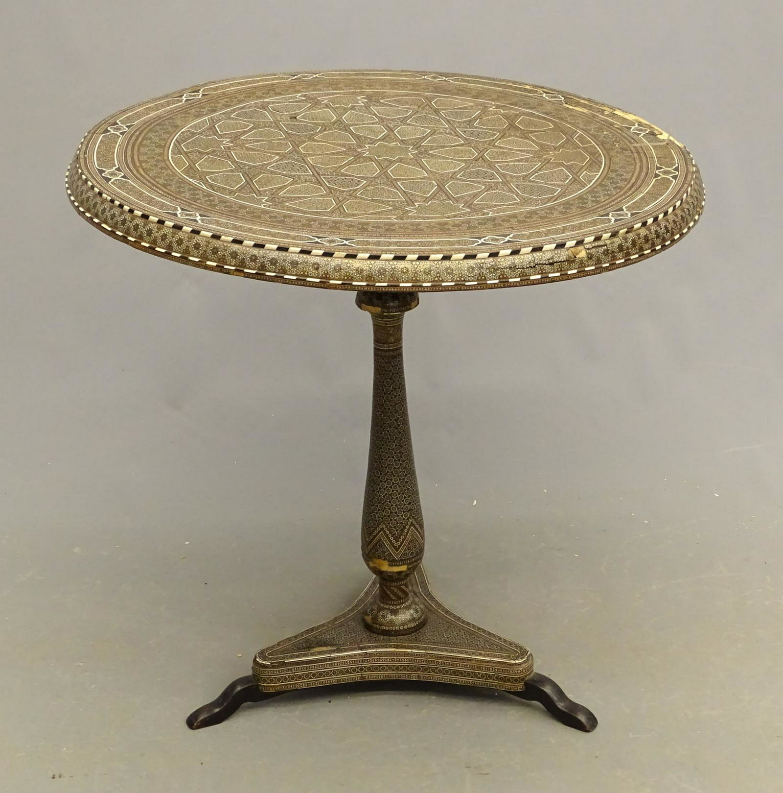 Moroccan Table: Early Moroccan table. Old Christies sticker (lot 160 11/22/80). As found. Top 30 1/2" D..