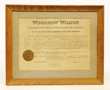 Woodrow Wilson Autographed Document: 1913 Woodrow Wilson autographed document. Sight 12" x 16 1/2".