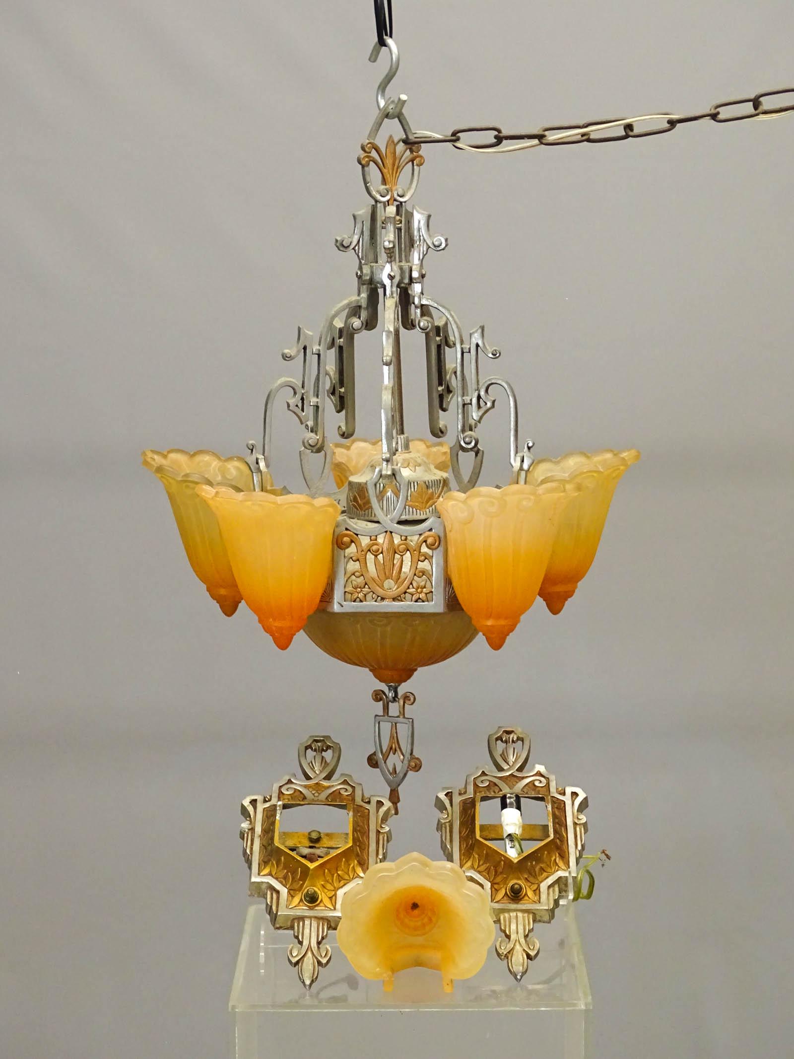 Art Deco Chandelier: Art Deco six light slip shade chandelier (with down light). Made by Lincoln Lighting Company. Along with sconces and single shade.