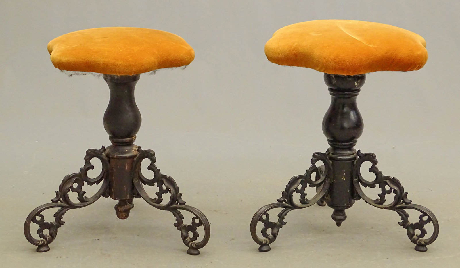 Pair Piano Stools: Pair wood and iron piano stools. 15" D., 19" Ht..