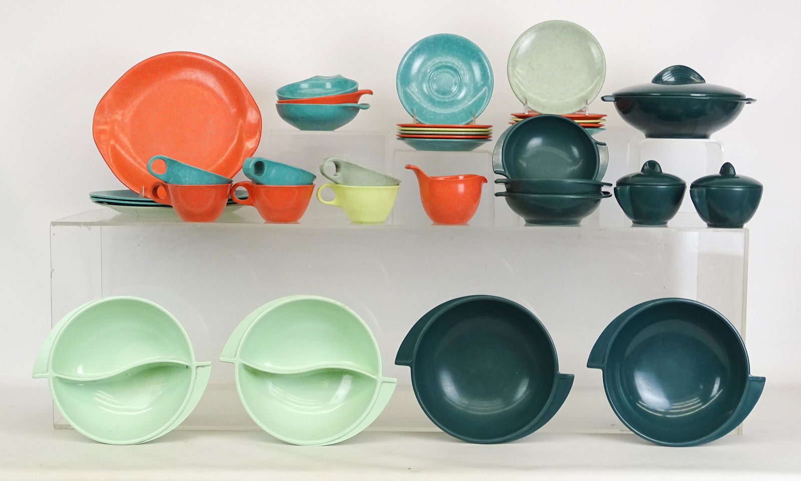 Mid Century Russel Wright Pottery: Collection of Russell Wright pottery, "Residential Dinnerware", (19) pieces, and "Boonton" dinnerware (10 pieces).