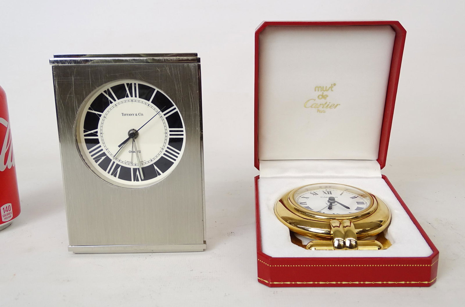 Tiffany & Cartier Desk Clocks: Lot including Tiffany and Cartier desk clocks. One in original case.