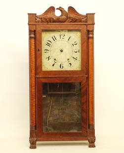 19th c. Seth Thomas Mantle Clock: 19th c. Seth Thomas mantle clock with carved eagle pediment. Figured maple columns and paw feet. 17 1/2" x 5" x 38".