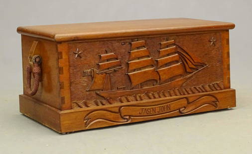 Carved Seaman's Trunk: Contemporary carved folk art Seaman's trunk, marked "JASEN JOHN". Rope handles. 41 3/4" x 20 1/2" x 18 1/4".