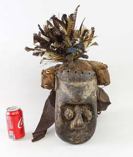 African Mask: African mask with feathers.