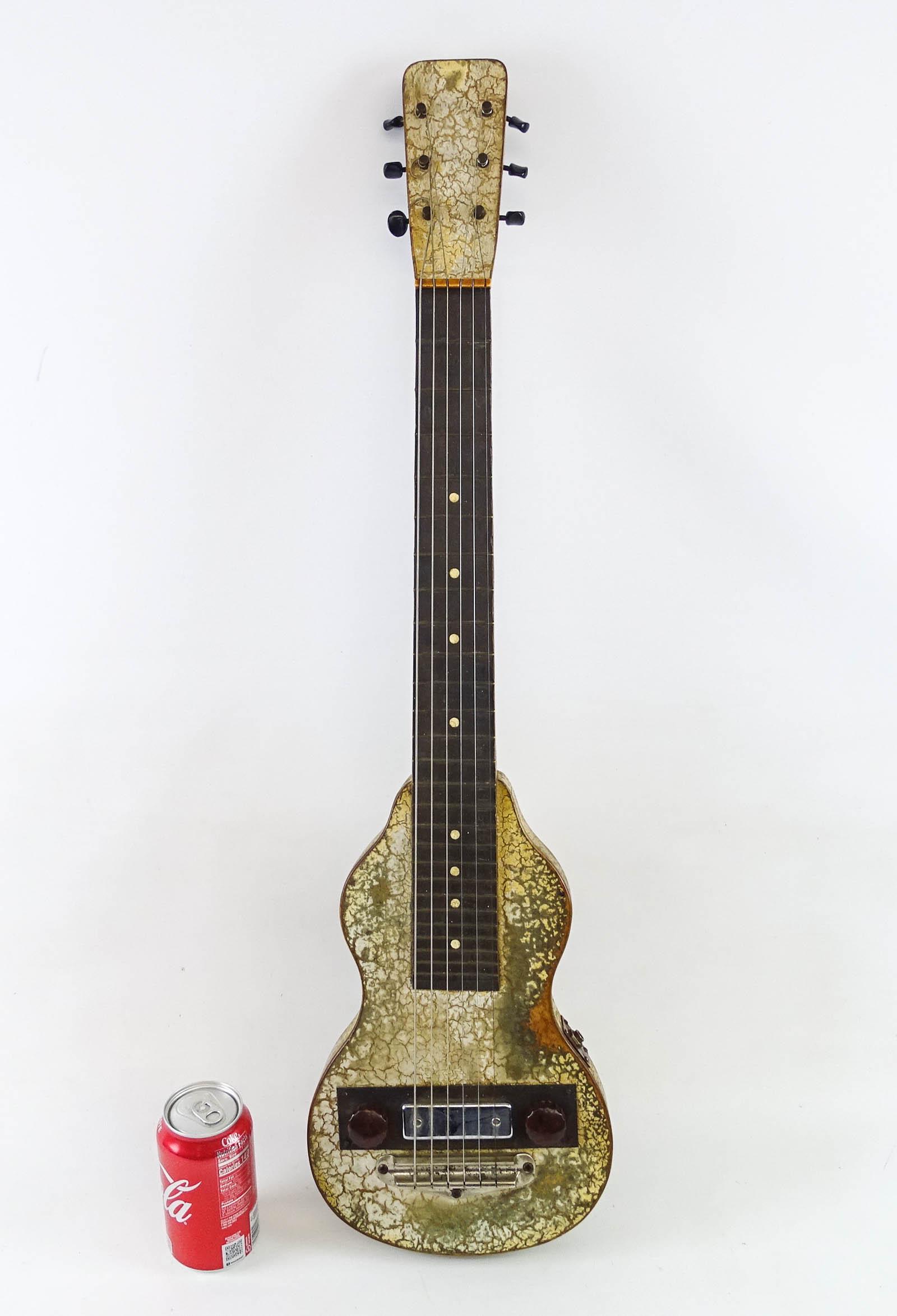 1950's Lap Steel Guitar: C. 1950's lap steel guitar. Kluson tuners (3 bent). 32" L..