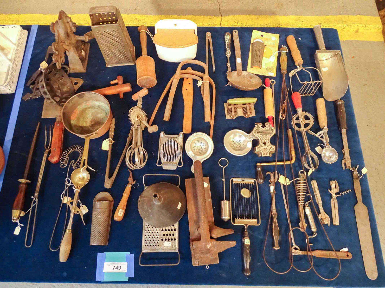 Kitchenware Lot: Misc. kitchenware lot including tinware, utensils, graters, cheese slicer etc..