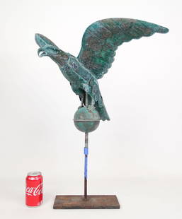 Eagle Weathervane: Eagle on ball weathervane. Copper with verdigris patina. 23 1/2" wing span, 19 1/2" Ht.. Stand not included.